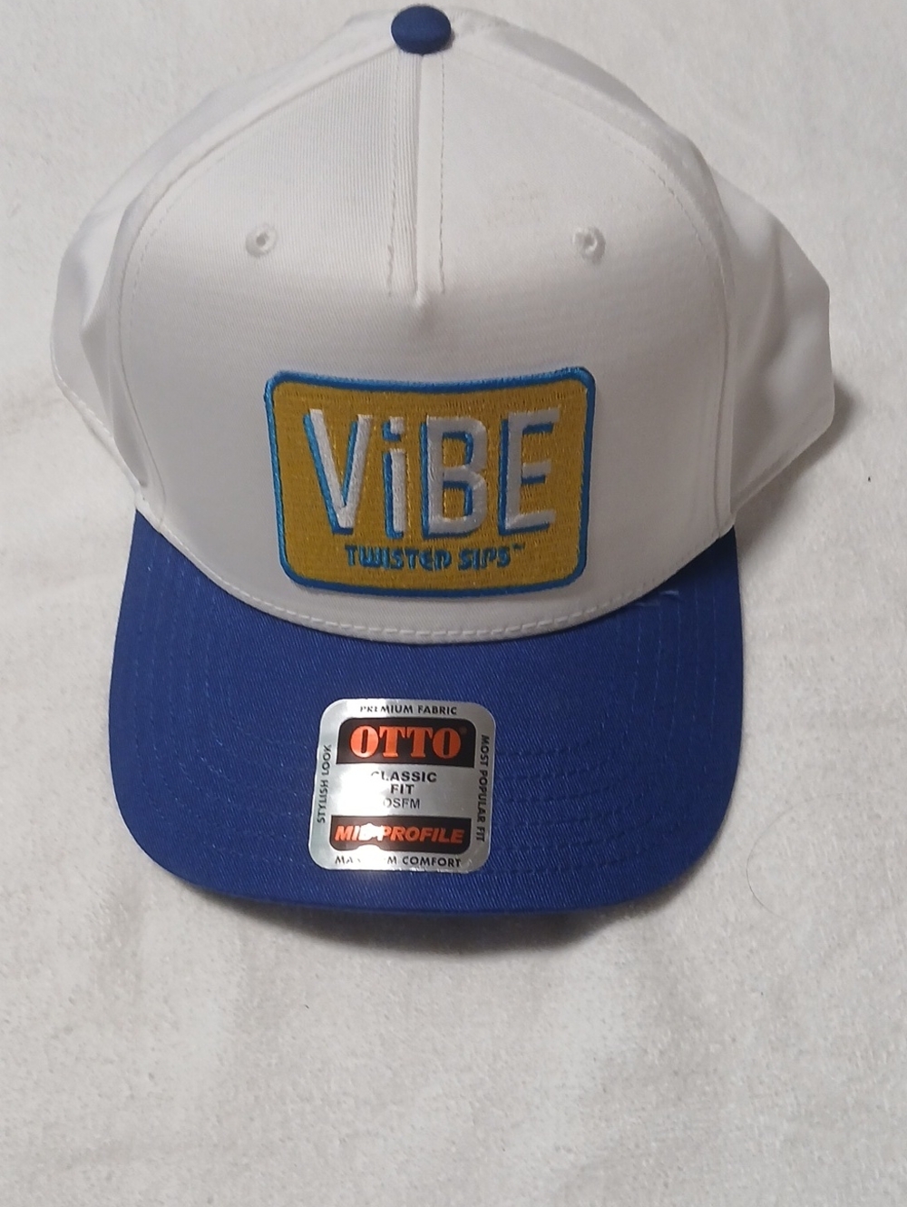 Vibe White, Blue and Yellow Patch Trucker Hat